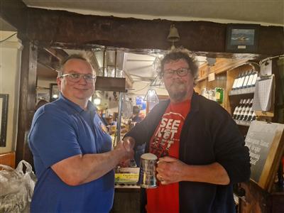 Presenting a tankard to Gerald, winner of the passport prize draw at the 2034 Clacton-on-Sea Real Ale & Cider Festival, at the Victory, Walton-on-the-Naze, 04/10/2023.